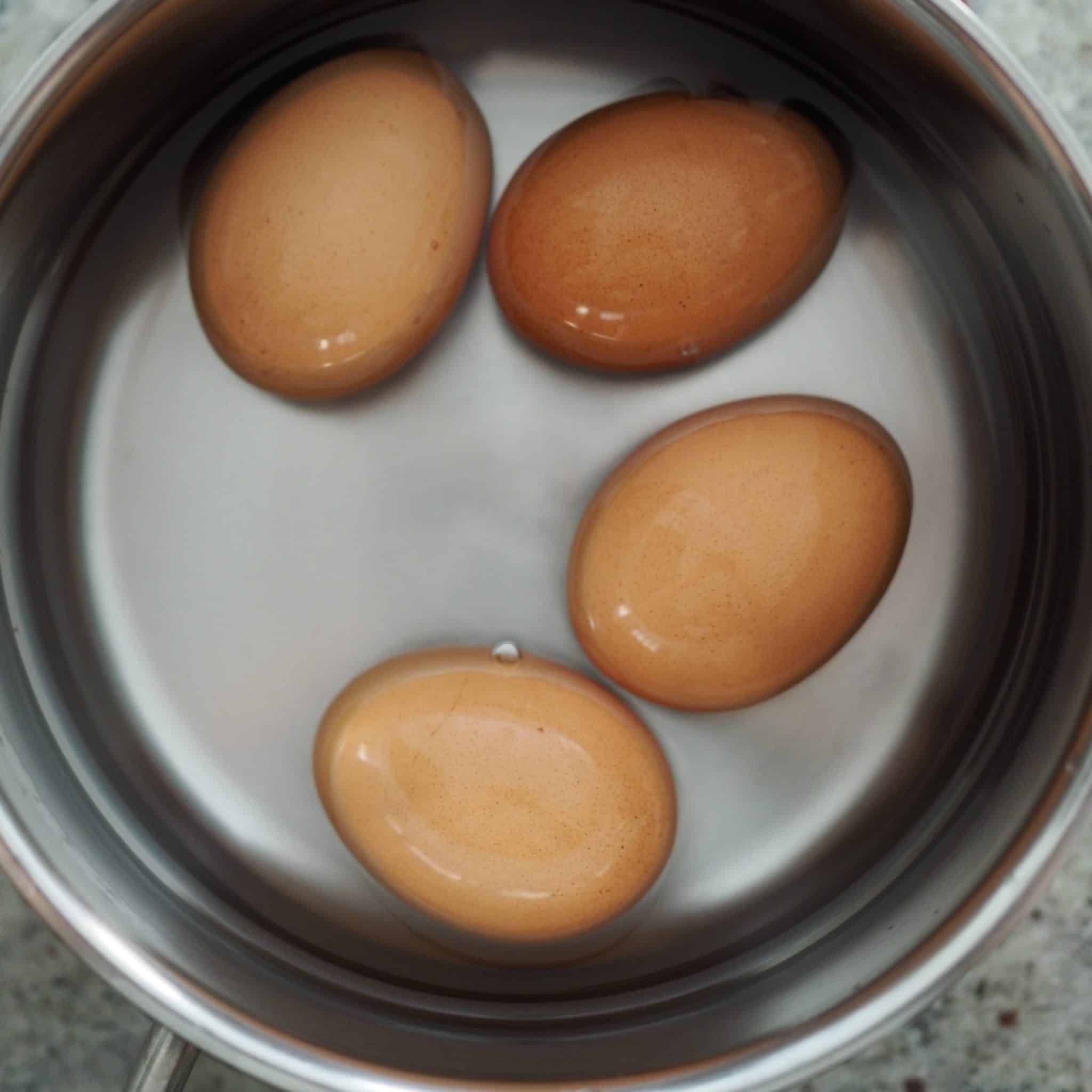 bring eggs to room temperature by soaking them in warm water for 5 minutes