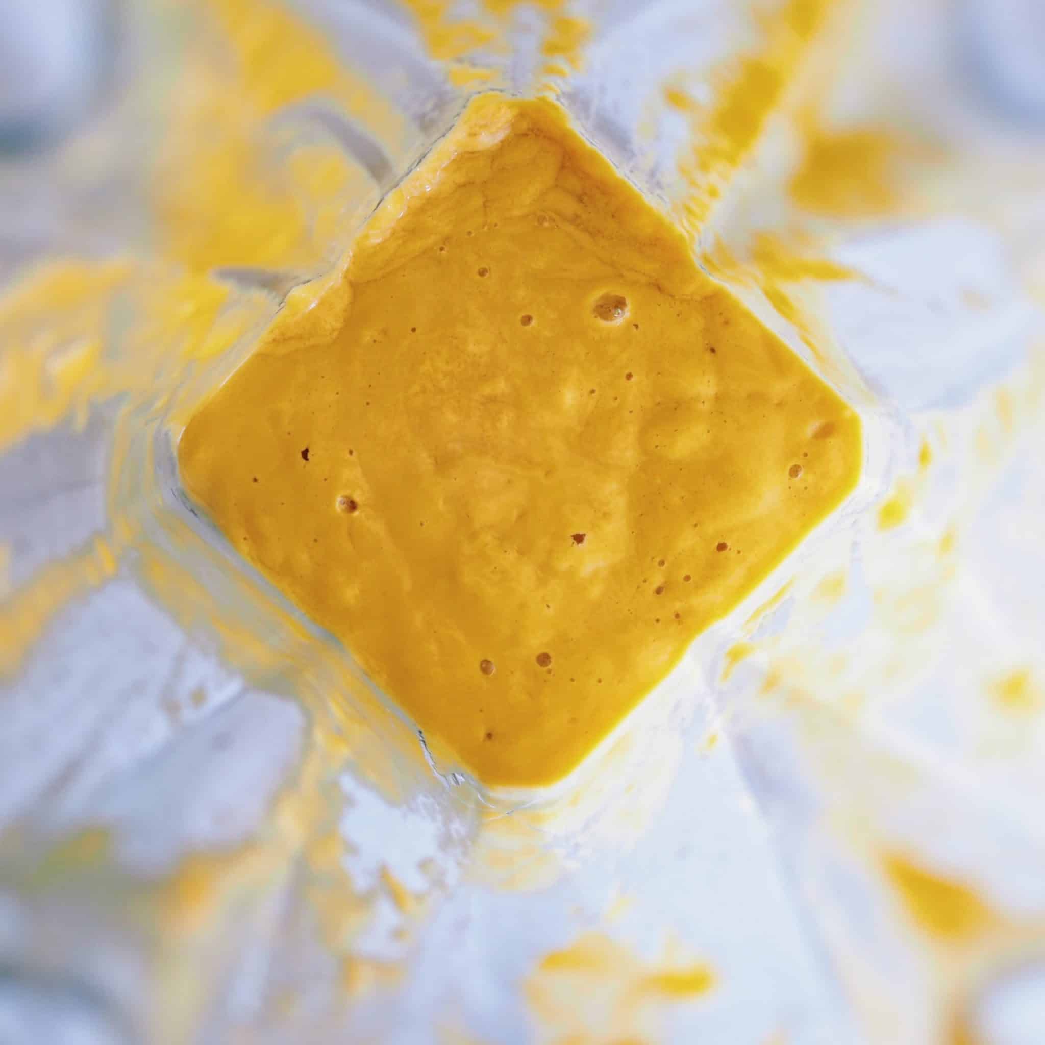 On the day of serving, blend together mango and coconut milk until smooth in a blender or food processor.