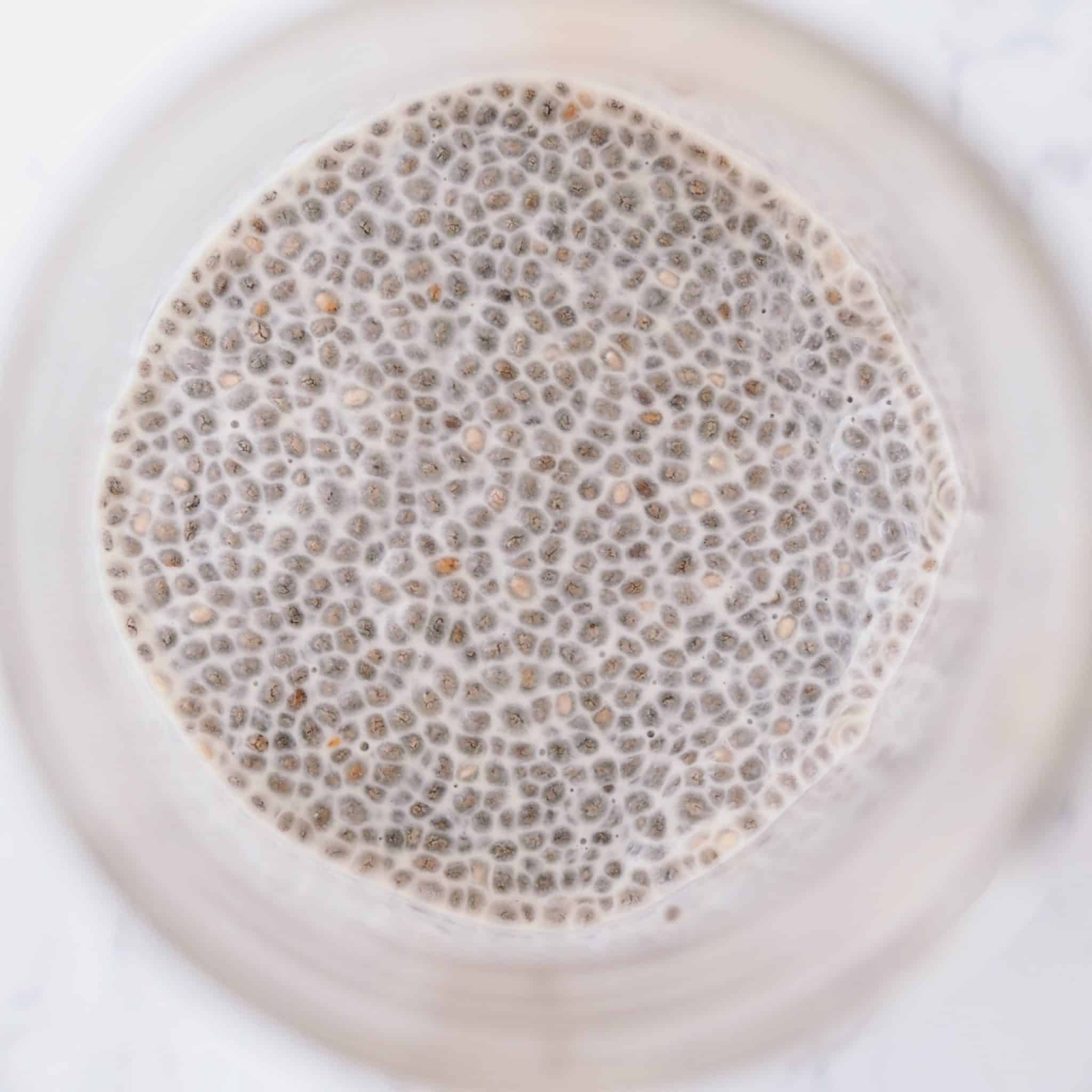 The night before in a resealable container, combine chia seeds and milk of choice. Mix very well. Before placing into the fridge, mix again in 10 minutes to break apart the chia seeds. They tend to clump together. Allow this to chill overnight.