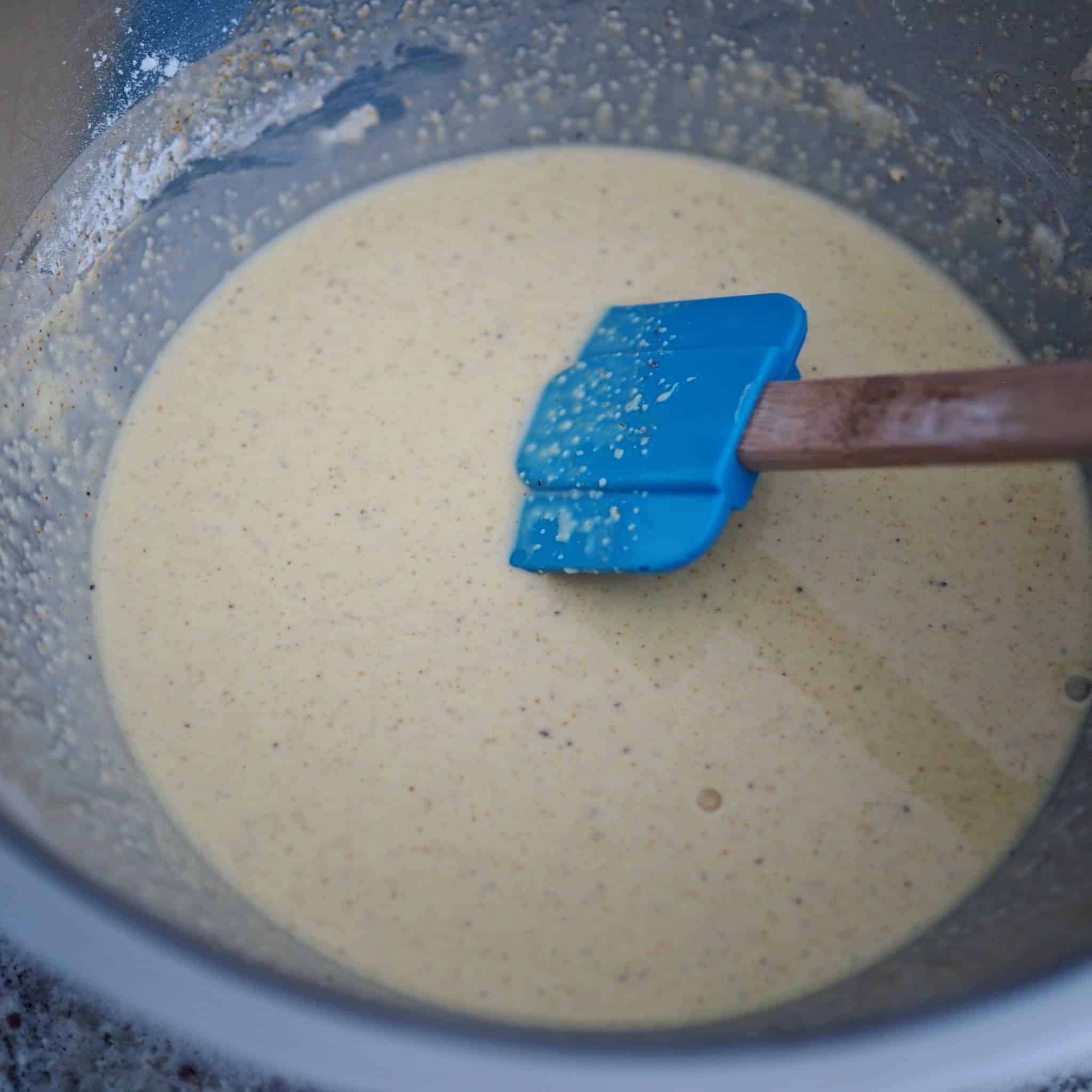 In another large bowl, combine Wet batter ingredients as listed until you have a thick but runny batter. The batter will settle and almost "solidify" but that is normal. You will just need to mix it again when you're ready to batter the chicken.