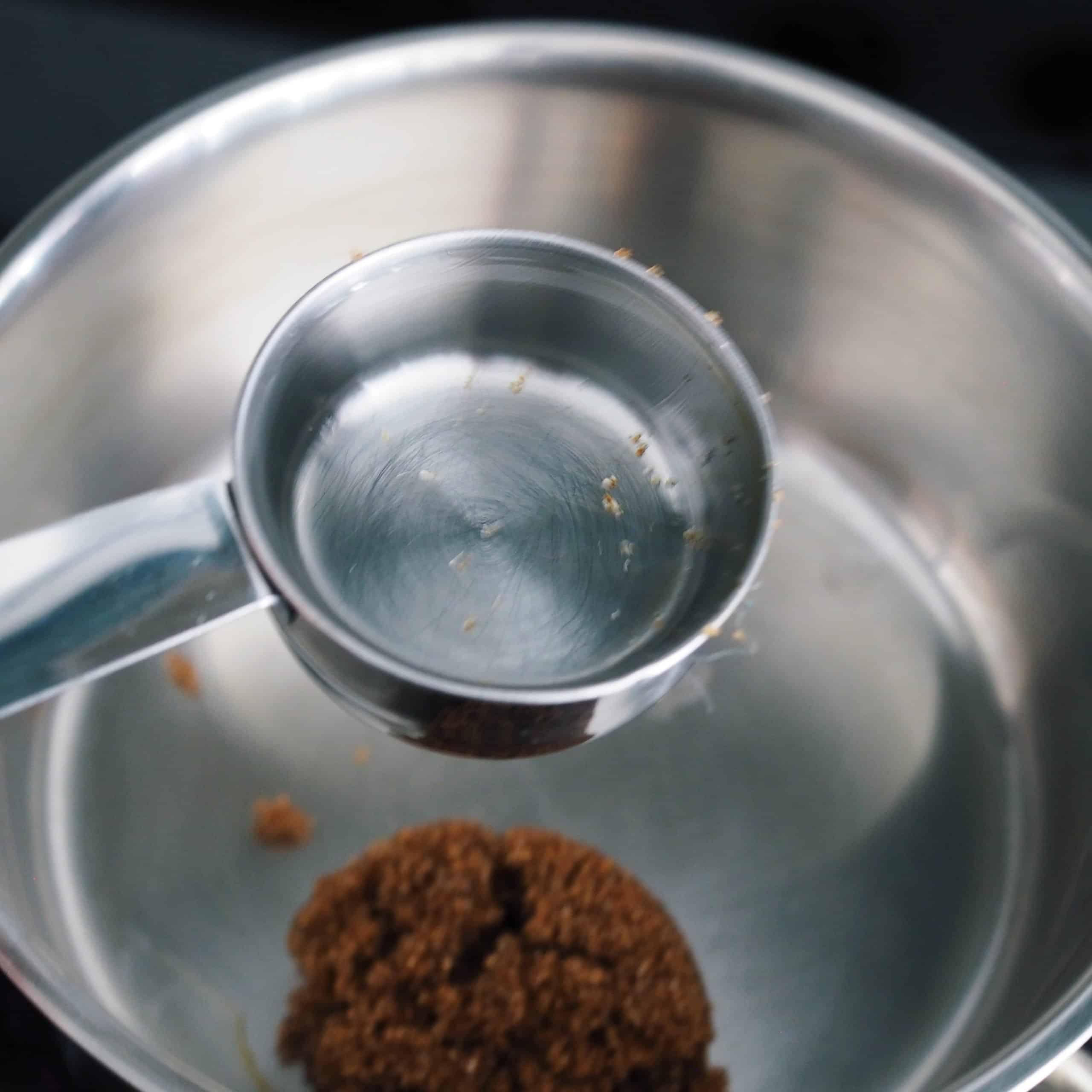 In a small sauce pan, add brown sugar and whisk in your water.