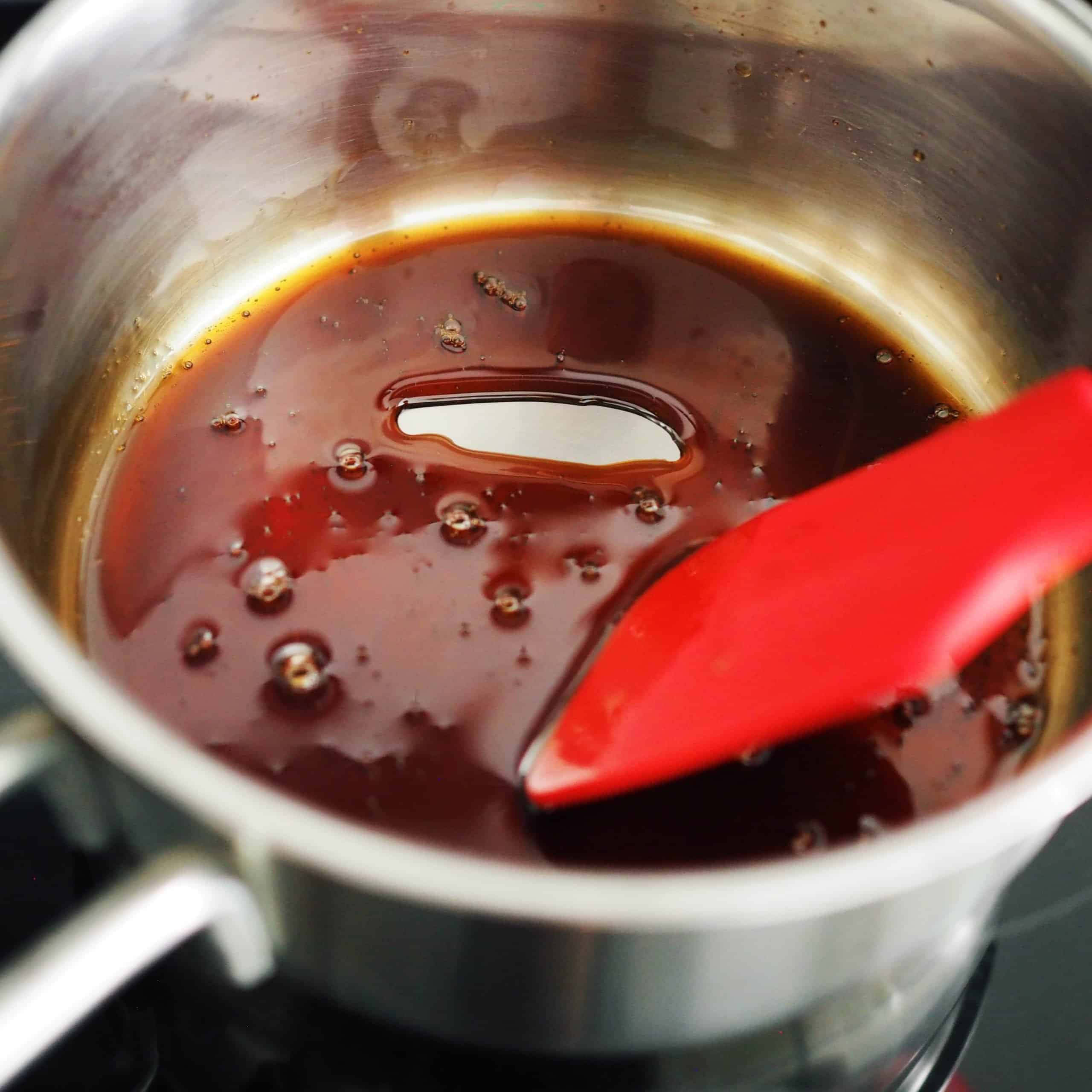 Bring this is a boil and then lower to a simmer to allow this to reduce to a thick syrup stirring consistently.