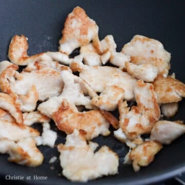 Heat 1 tablespoon or 15 ml of vegetable oil in a large pan on medium heat. Fry marinated chicken until cooked through and golden, about 4-5 minutes. Remove chicken from the pan and set aside.