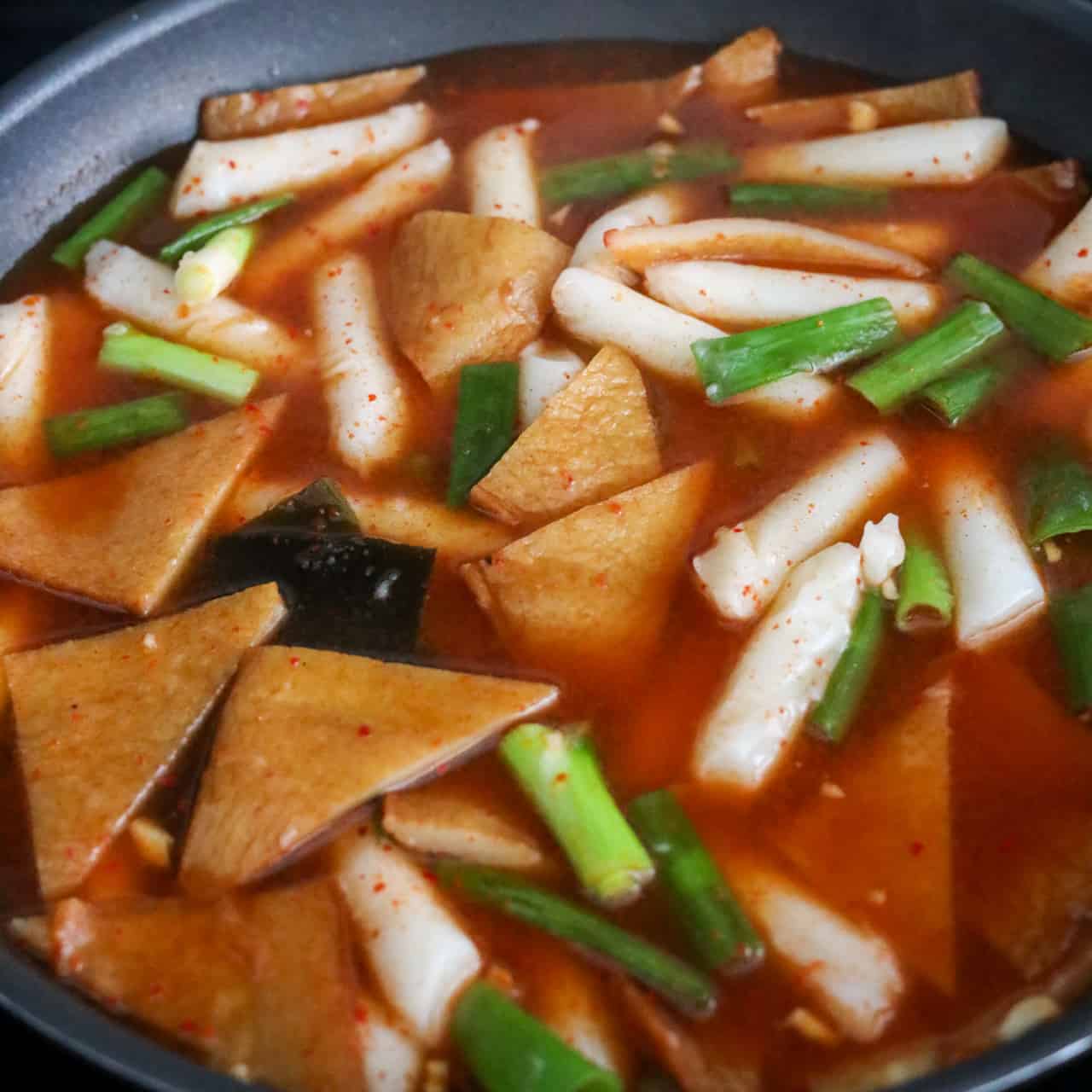 Add Fish Cakes, Rice Cakes & Onions