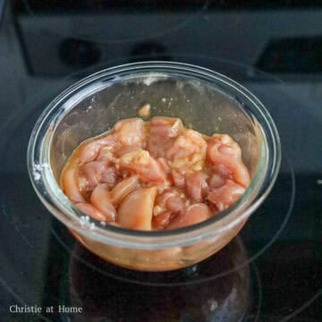 In a large bowl of sliced chicken thighs, mix in the marinade ingredients as listed above and marinate for 10 minutes.