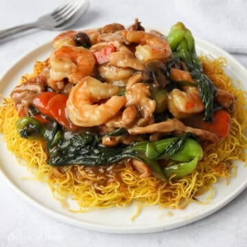 Pour everything in the pan over the center of the crispy noodles. Enjoy!