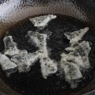 Heat vegetable oil in a large pan on medium heat, around 325-350 F with a digital instant read thermometer. Deep fry the chips rice paper side down until they become white and crackled and light brown on the edges, about 10-15 seconds. Don't over fry.