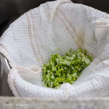 Transfer finely chopped cabbage to a large bowl. Add salt and massage it into the leaves. Rest for 10 minutes to draw out excess liquid and then rinse cabbage with running cold water. Strain and transfer cabbage to a clean towel to squeeze out as much excess water.