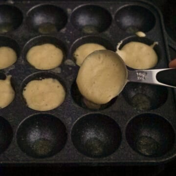 Heat the aebleskiver pan on low-medium heat and grease with melted butter. Then fill each well halfway with batter.