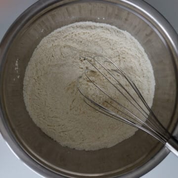 In a large mixing bowl, whisk together flour, sugar and salt until combined and set aside.