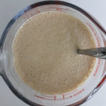 Heat milk until warm in the microwave or on the stovetop until 110 F and gradually add dry active yeast while whisking. Cover and rest for 10 minutes until thick and frothy.