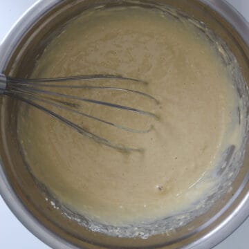 Add the yeast mixture to the dry ingredients, followed by eggs and vanilla extract and mix until combined.