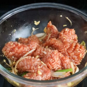 Tenderize the pork loin center-cuts on by lightly scoring both sides in a diamond pattern or use a meat mallet and pound the pork, but don't pound it too thin. Then transfer to a large mixing bowl and add the marinade ingredients as listed above and mix well. Cover and marinate for at least 30 minutes or overnight for best results.