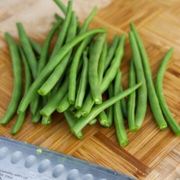 Wash and trim the pointy hard ends of green beans. Optional: feel free to chop them into smaller segments.