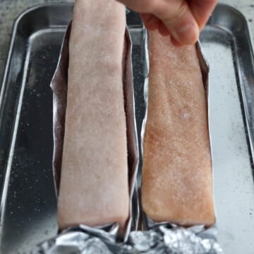 Lightly brush the skin with vinegar and do not drench it. Next generously sprinkle enough salt on top of the skin.