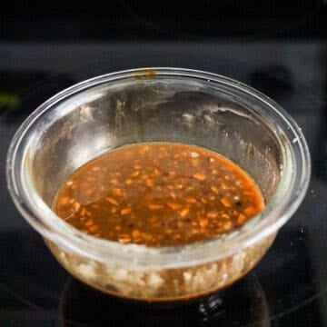 In a small bowl, combine the noodle sauce ingredients as listed above and set aside.