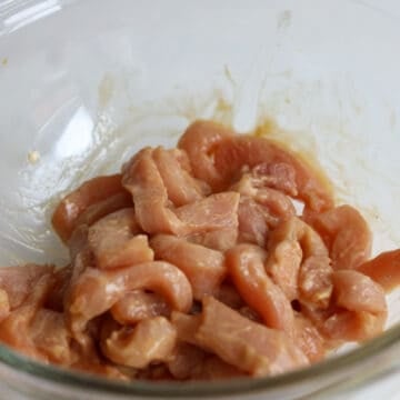 Marinate sliced pork with Marinade ingredients as listed for 20 minutes at room temperature.