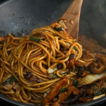 Afterward, add noodles and noodle sauce. Finally toss until noodles are coated in sauce and most of sauce has evaporated. Serve and enjoy!