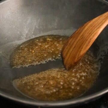 Reduce to medium heat, pour in the prepared gravy sauce into the pan and simmer to thicken, about 1 minute. Â