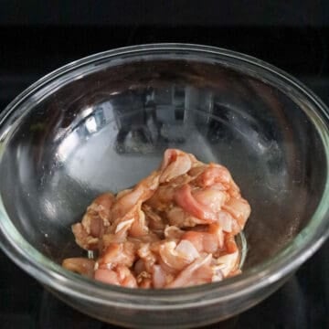 Marinate sliced chicken thighs with chicken marinade ingredients as listed above. Set aside as you prepare other ingredients.Â