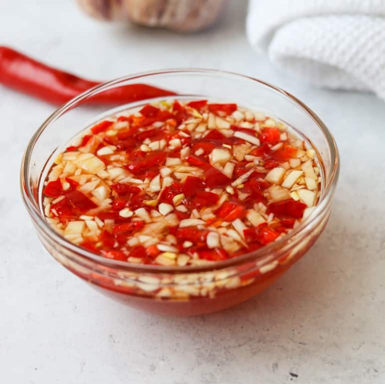 In a small bowl, combine Nước Chấm ingredients as listed together. Serve as a dipping sauce with chicken.