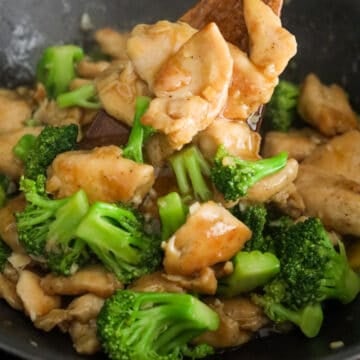 Add in cooked chicken and toss everything together. Remove off heat. Serve and enjoy!