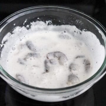 Add seasoned shrimp and mix well until shrimp is coated in batter with tongs or chopsticks.