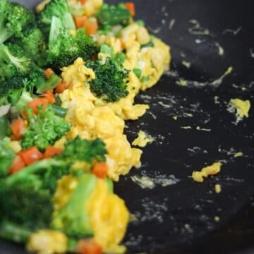 Add oil and beaten eggs and scramble them.