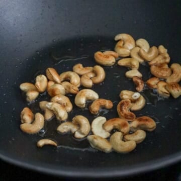 toast cashews in oil on medium high heat and remove