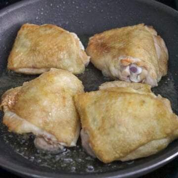 Sear chicken thighs on each side for 2 minutes on medium-high heat.