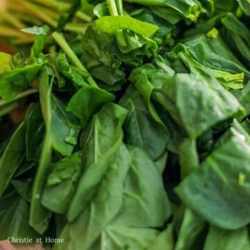Chop your spinach into 2-inch-long pieces trimming off the roots or ends