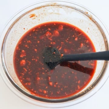 In a large bowl, combine chicken marinade ingredients as listed. Use a fork to help you smash the fermented red bean curd. Set aside.