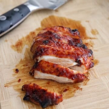 The chicken should come out looking a bit charred on the edges. Remove from air fryer and let it rest for 5 minutes before slicing into pieces and enjoy!