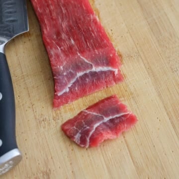 Slice flank steak on a bias into ¼-inch thick pieces.