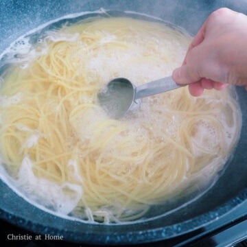 Bring a large pot of water to boil on medium-high heat and season with 1 tablespoon of salt. Boil pasta until al dente according to packet instructions, about 9-10 minutes for spaghetti. Then reserve ¼ cup or 60 ml of the cooking pasta water and set aside. Strain pasta.