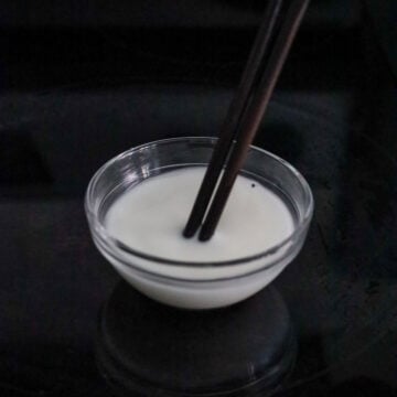 Make the cornstarch slurry by combining water and cornstarch.