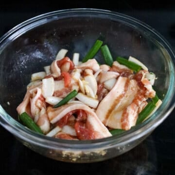 Transfer sliced pork belly to a large mixing bowl. Add marinade ingredients to the bowl and mix well with pork. Cover and marinate for at least 15 minutes or overnight.