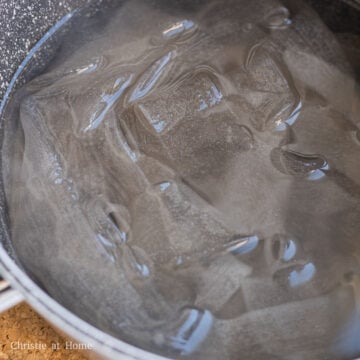 Bring a medium-sized pot filled halfway with water to a boil on medium high heat. Then add the noodles and boil them for 5 minutes.