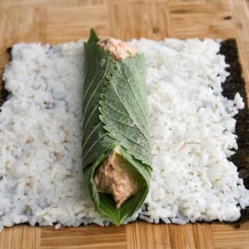 Fold the perilla leaves over the tuna mixture, to hold the tuna mixture in.