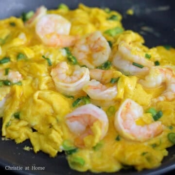 Then slowly scramble the eggs with the shrimp until the eggs are shiny, moist and cooked through