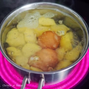 In a medium pot filled with enough water, bring to a boil on medium-high heat. Add chopped potatoes and eggs into the same pot to make it easier. Boil the potatoes for 10-15 minutes until fork tender. Hard boil the eggs for 9 minutes, then remove and transfer them into an ice bath. Once the eggs cool down, crack and peel them. Strain the potatoes in a colander.