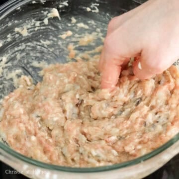Add the remaining filling ingredients as listed above to the bowl of minced shrimp and mix in one direction until the mixture breaks down and the pork becomes a sticky paste. If you have a food processor, add your filling ingredients and grind until it’s pasty and well combined.