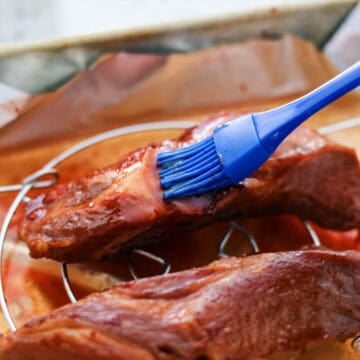Then remove the pork from the oven and baste again. Bake for 10 minutes. Repeat one more time. (You should baste a total of 3 times and bake 4 times at 10 minute intervals).