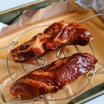 Place pork on the wired rack giving enough space between each other and bake for 10 minutes