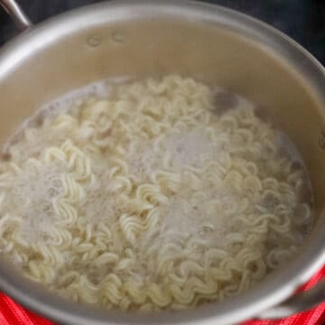 Then in a small pot, add suggested amount of water (or refer to the amount specified on the ramen packet if it calls for less), bring to a boil. Add instant ramen noodles and boil for 2 minutes or until al dente.