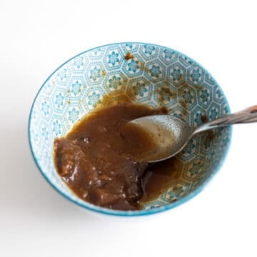 mix tamarind paste and 2 tablespoon hot boiling water and mash it up and run the paste through a sieve reserving the liquid