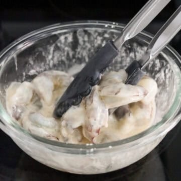 If needed, peel and devein shrimp. Rinse shrimp with cold water a few times to remove any remaining shells or dirt. Strain the shrimp and pat dry with paper towels to remove excess moisture. Then transfer to a large bowl. Combine shrimp with marinade ingredients as listed above and mix well. Set aside for 10 minutes.