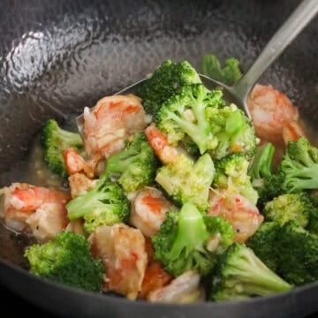 Toss back in broccoli florets and shrimp. Once mixed remove off heat and serve with rice. Enjoy!