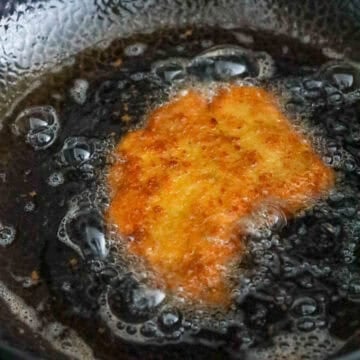 fry pork cutlet until golden brown