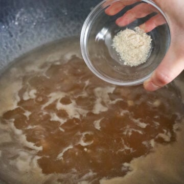 Season broth with soy sauce and chicken powder.